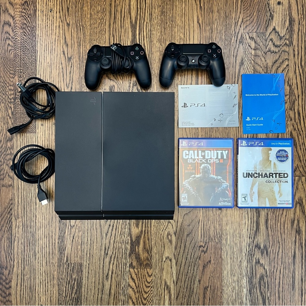 SONY PlayStation PS4 Model CUH-1215A Console with 2 controllers and 2 games
